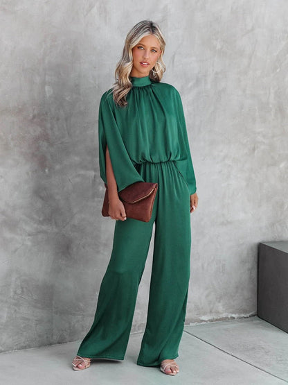 Elegant vrouwelijke jumpsuit groen lente 2024