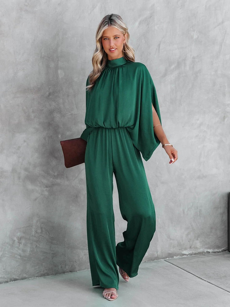 Elegant vrouwelijke jumpsuit groen lente 2024